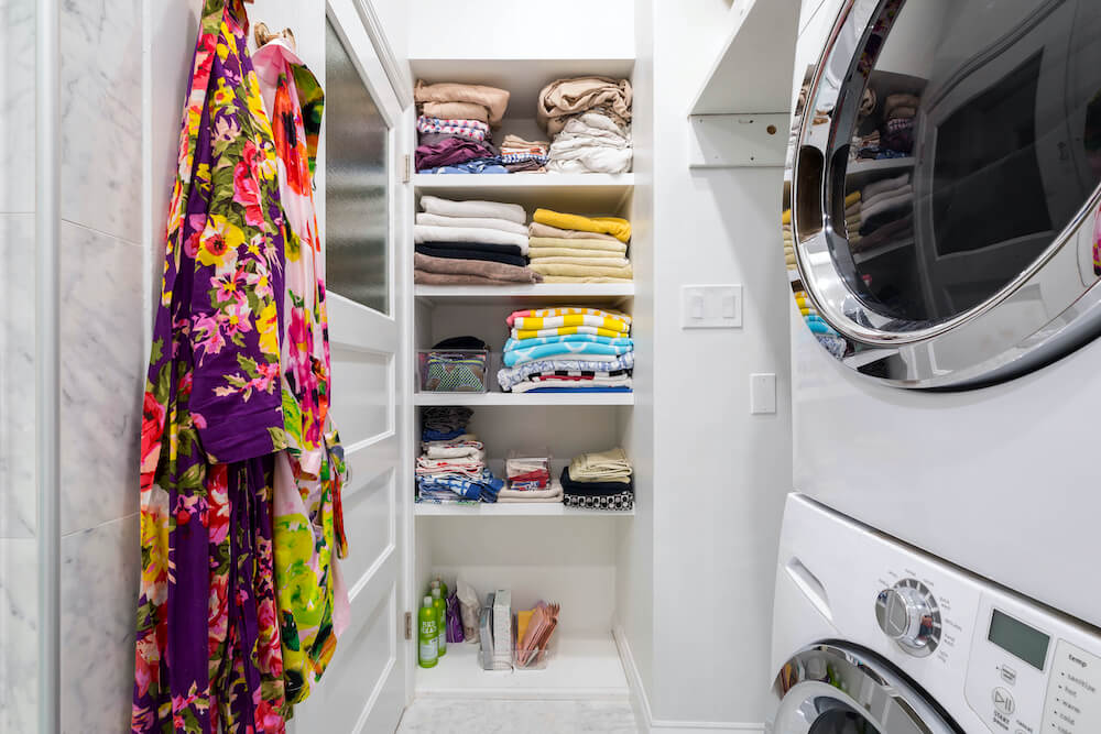 Storage shelving in the laundry area in the bathroom