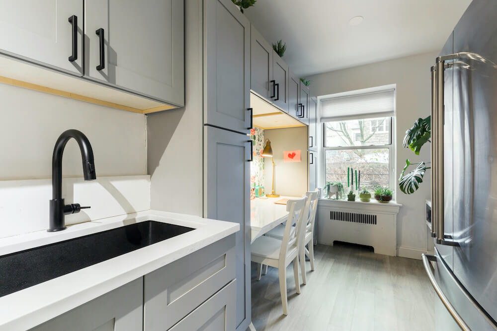 Home office kitchen with Gray cabinets with matte black hardware