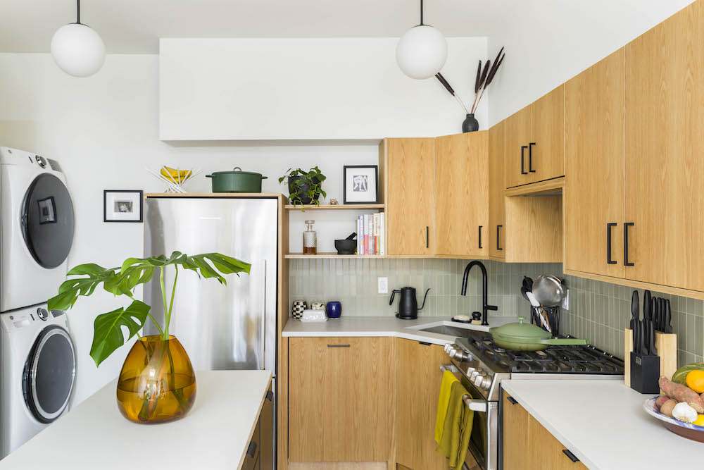 plywood kitchen with wood cabinets and stainless steel appliances