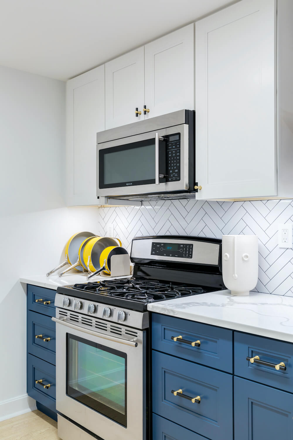 Blue and white two tone kitchen cabinets