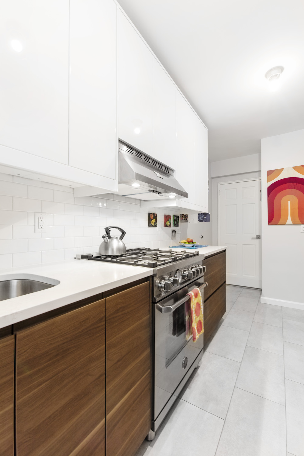 Two-tone white and wood kitchen cabinets