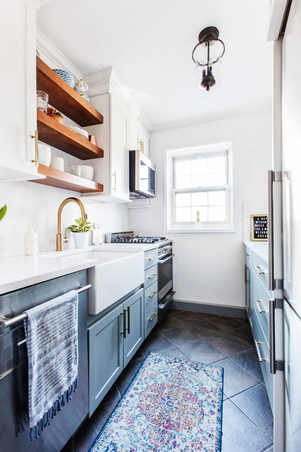 Galley kitchen with wooden open shelving