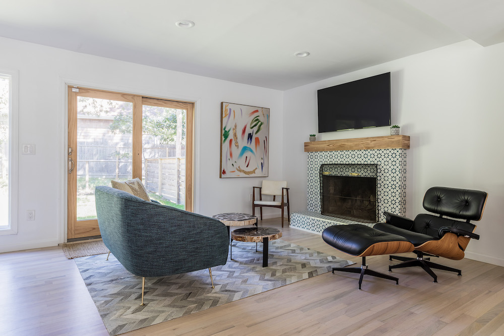 Living room with moroccan tiled fireplace
