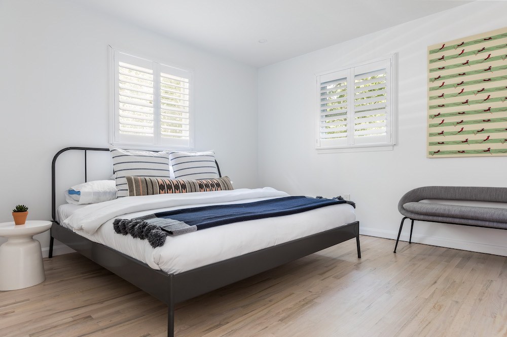 Bedroom with window shutters