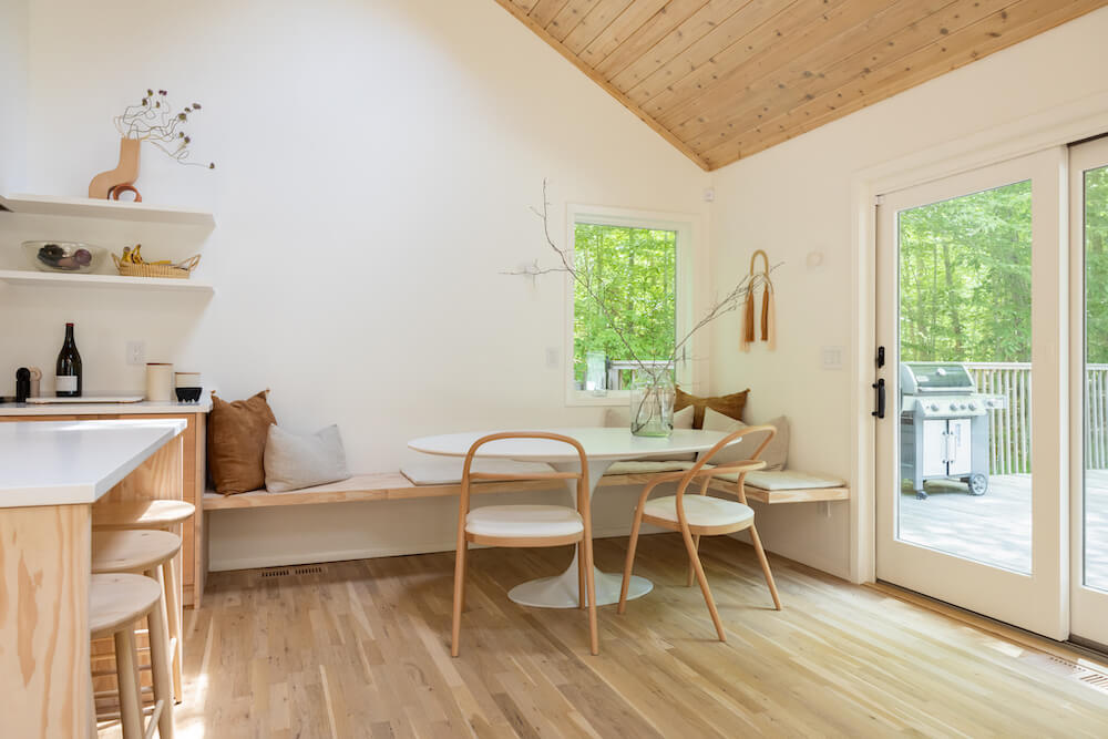 Breakfast nook between the kitchen and doors to the deck