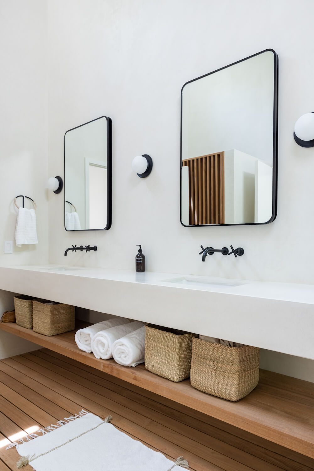 White marble double vanity with storage underneath