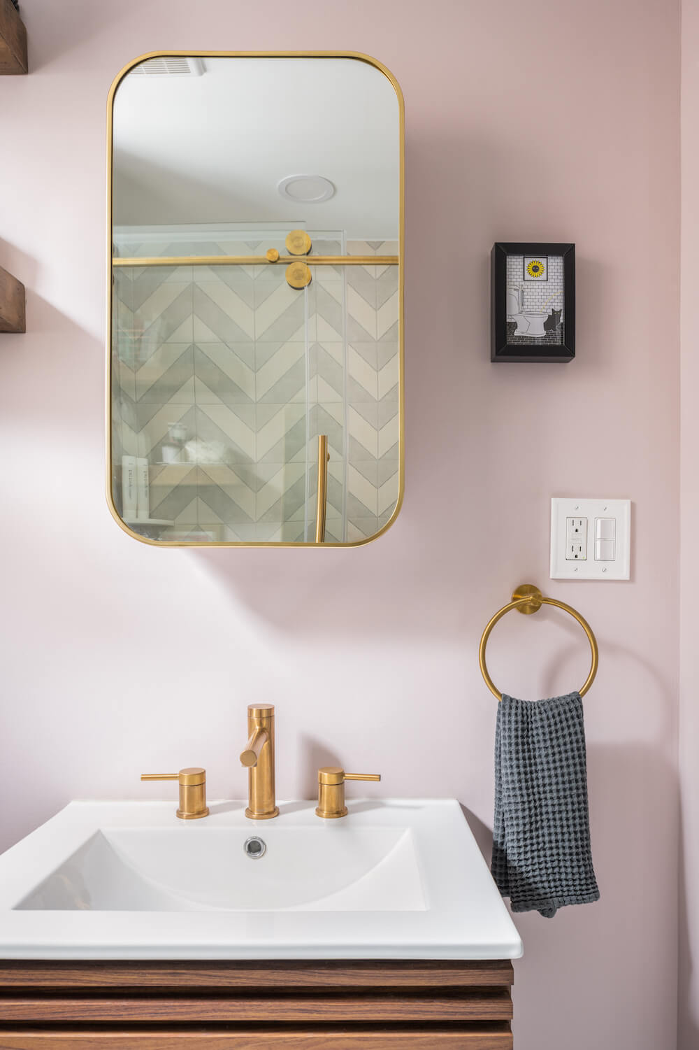 Vanity and mirror with bronze hardware