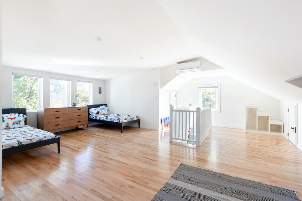 attic renovation with dormer and beds