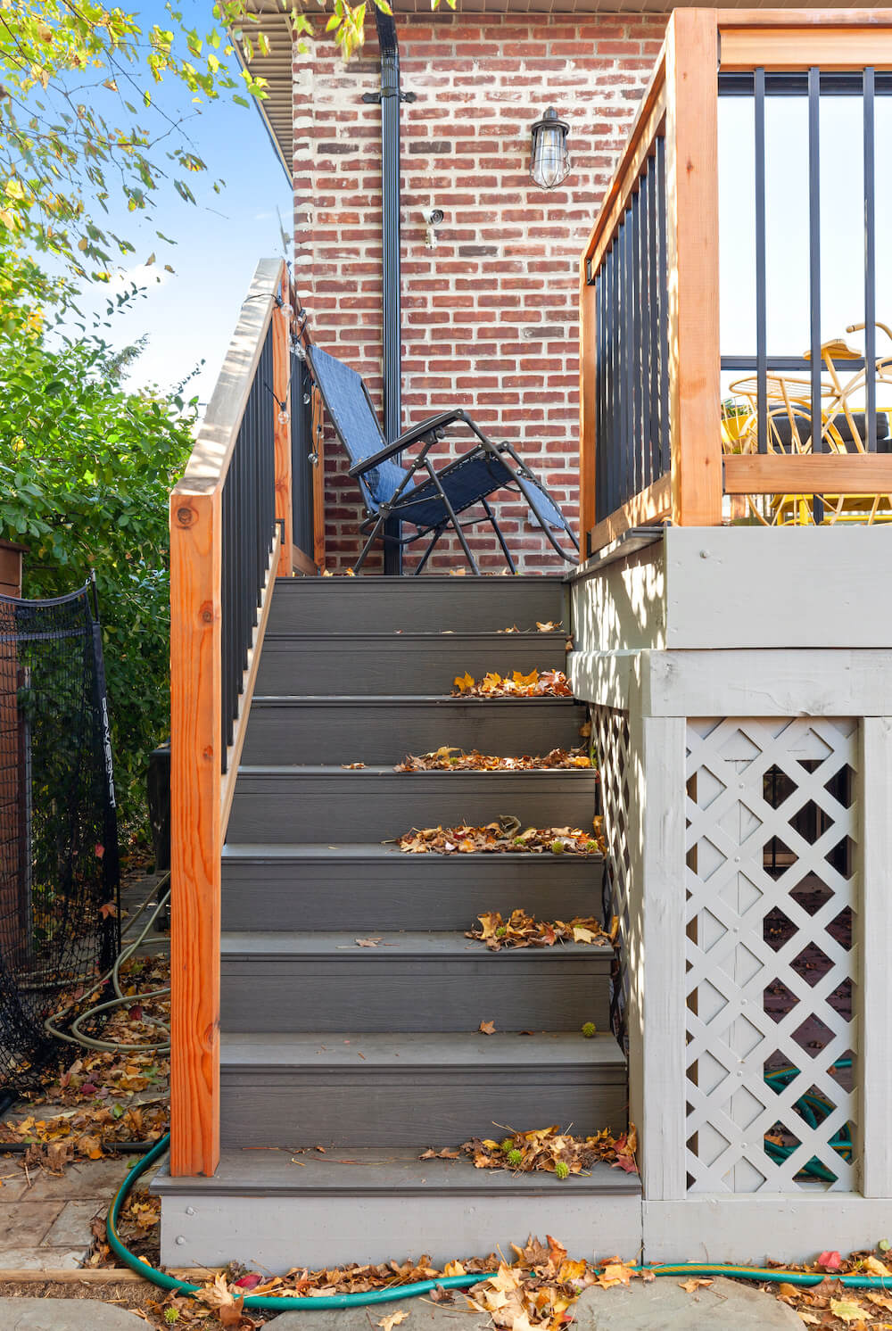 house addition with patio stair