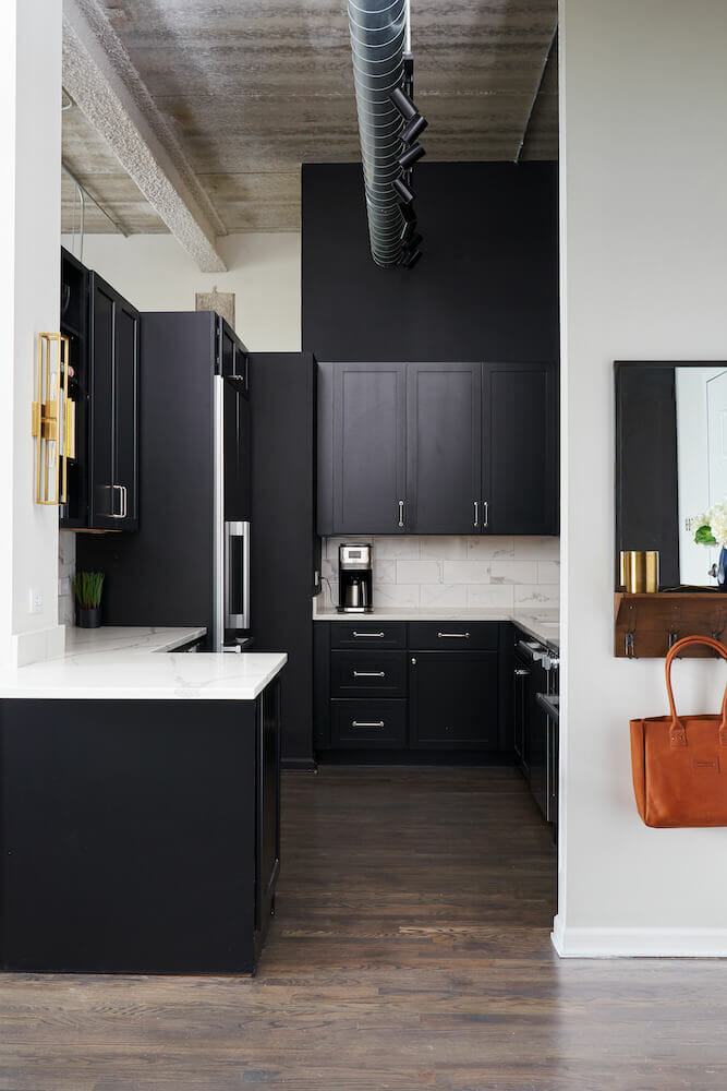 black kitchen in a Chicago loft renovation