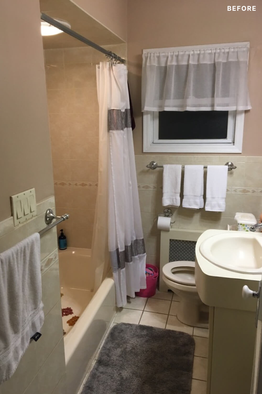 Beige bathroom with pedestal sink and bathtub before renovation