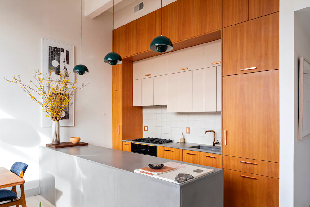 wooden_kitchen_cabinets_with_concrete_peninsula