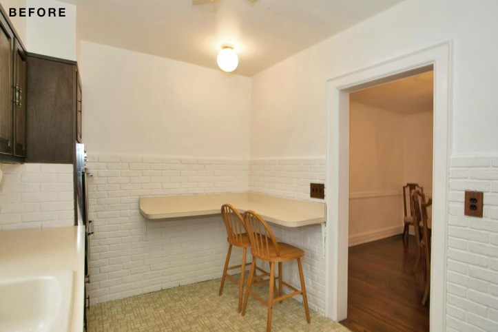 white subway tiles in a beige kitchen with breakfast bar before renovation